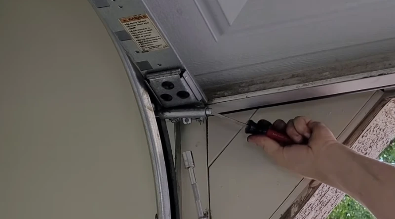 RG Door Experts technician responding to a late-night emergency garage door call