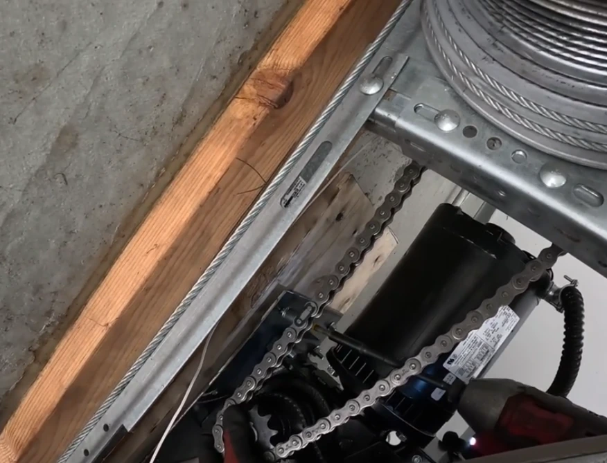 Technician servicing a commercial overhead garage door in rio rancho